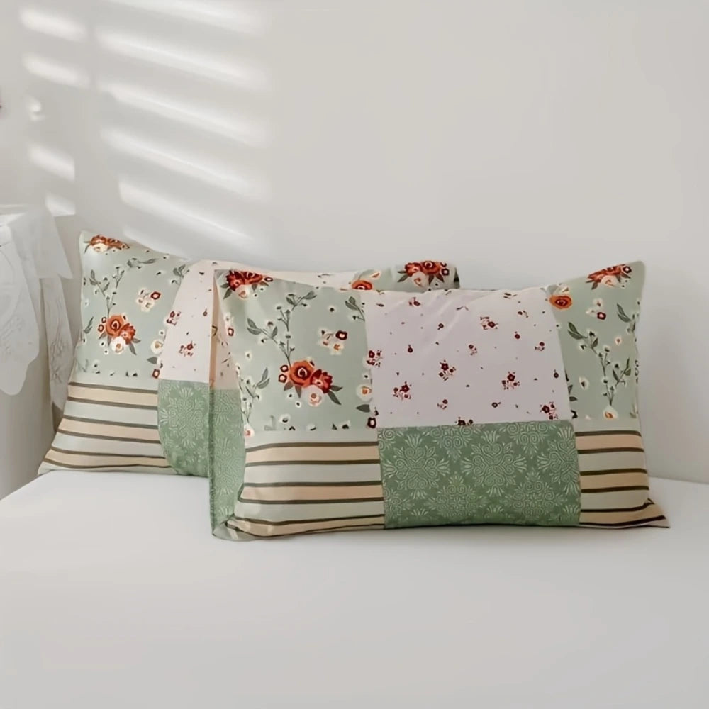 Side view of bed with floral geometric cover set
