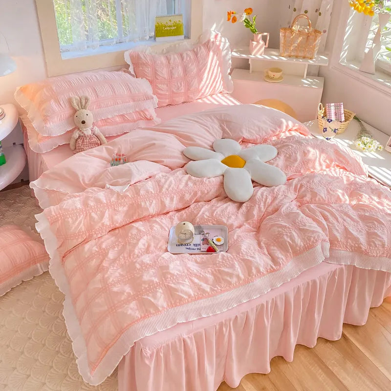Cozy pink plaid duvet cover set with lace edges on a sunlight bedroom bed