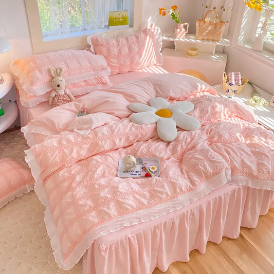 Cozy pink plaid duvet cover set with lace edges on a sunlight bedroom bed