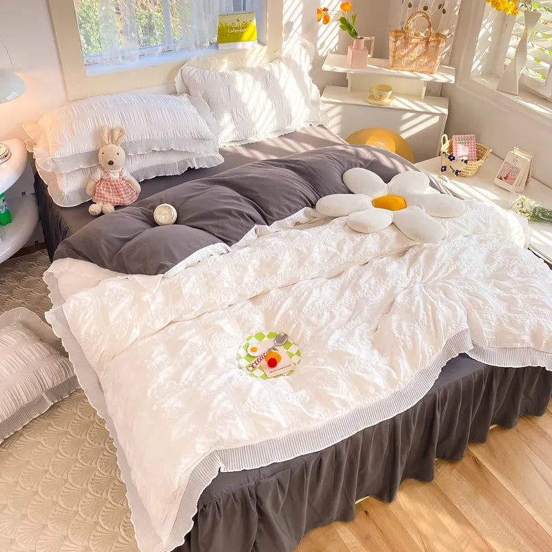 Bedroom with natural light highlighting the pink plaid duvet cover set