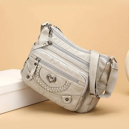 Vintage Vegan Leather Multi-Pocket Crossbody Bag with Heart Accent