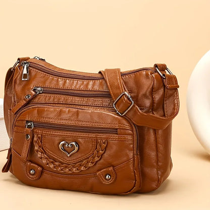 Vintage Vegan Leather Multi-Pocket Crossbody Bag with Heart Accent